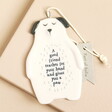 A charming porcelain dog hanging ornament