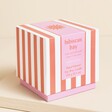 Packaging for the Paddywax Hibiscus Bay Cabana Red Striped Ceramic Candle