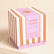 Packaging for the Paddywax Sienna Sunset Orange Stripe Ceramic Candle