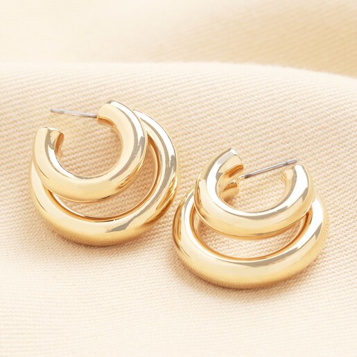 Illusion Double Polished Hoop Earrings in Gold A pair of double hoop earrings in polished gold.