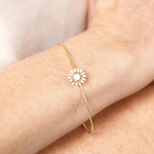 Close Up Model Shot Close Up Model Shot of Adjustable Opal Flower Open Bangle in Gold on Model