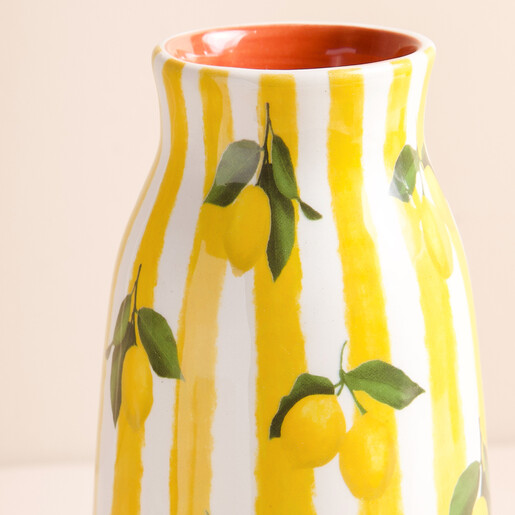 Close Up of Yellow Striped Lemons Vase