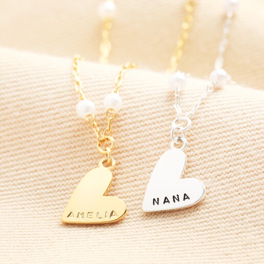 Two necklaces Personalised Beaded Pearl Heart Pendant Necklace on a neutral background