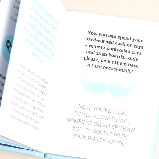 Opened Page of Things to Do Now That You're A Dad Book