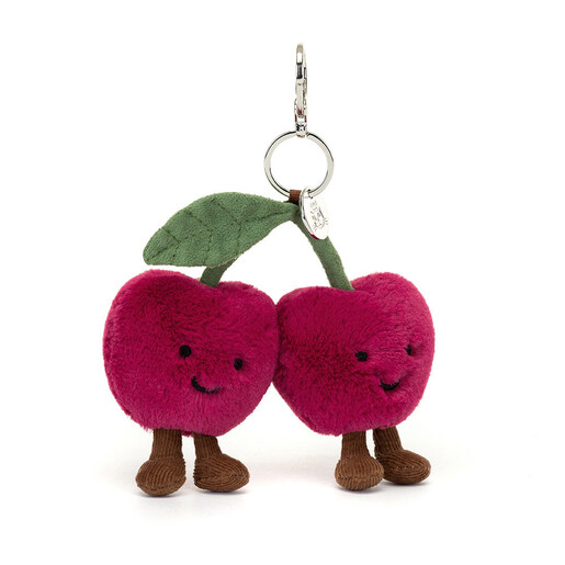 A cheerful cherry duo with stitched smiles