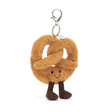 A playful pretzel-shaped bag charm plushie