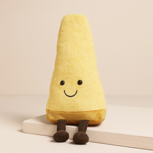 A quirky soft toy shaped like Parmesan cheese