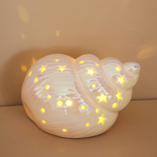 Ceramic LED Conch Shell Light on neutral background