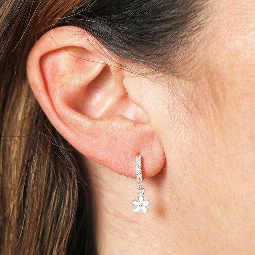 Close Up of Sterling Silver Flower Crystal Huggie Hoop Earrings in Silver