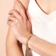 Model Shot of the Flower Beaded Bracelet in Gold