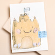 Laura Skilbeck Sandcastle Seaside Card on a neutral background