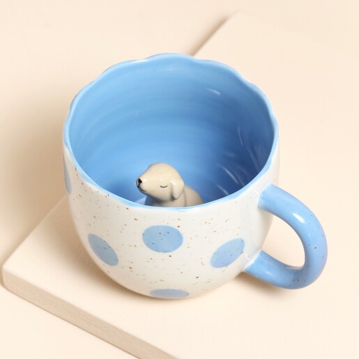 This surprise dog mug reveals a hidden dog token