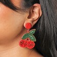 Close Up of Beaded Red Cherry Drop Earrings