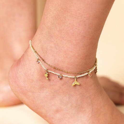 Stainless Steel Dolphin Double Layer Anklet in Gold on a model