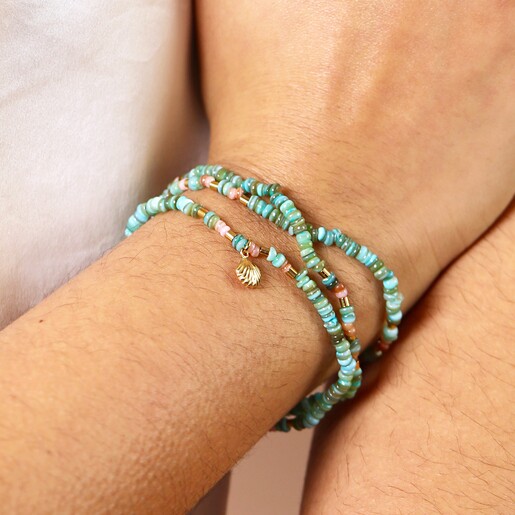 Close Up on Model as Bracelet Close Up Model Shot of Green Shell Charm Beaded Bracelet in Gold  on Model
