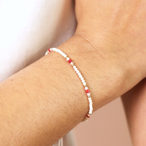 Model close up Pull Cord White and Red Beaded Bracelet on a model