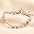 A waterproof bracelet made of stainless steel with large, bubbled, silver ball-shaped beads.