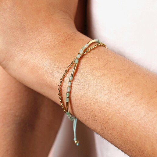 Model Stainless Steel and Turquoise Beaded Double Layer Cord Bracelet in Gold on a model