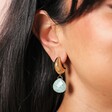 Close Up of Semi Precious Amazonite Teardrop Drop Earrings in Gold on Model