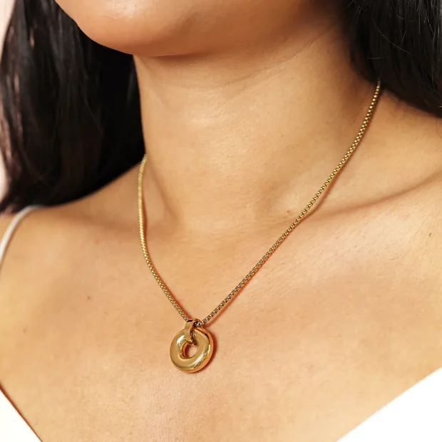Stainless Steel Doughnut Pendant Necklace in Gold Stainless Steel Doughnut Pendant Necklace in Gold