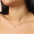 Stainless Steel Mini Heart Pendant Necklace in Gold close up on a model