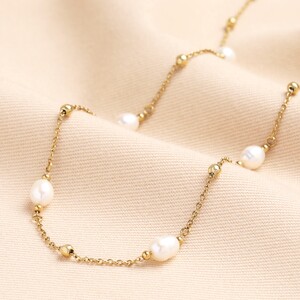 Stainless Steel Pearl and Ball Long Chain Necklace in Gold