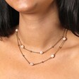 Stainless Steel Pearl and Ball Long Chain Necklace in Gold on model