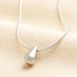 Stainless Steel Teardrop Necklace in Silver on a neutral background