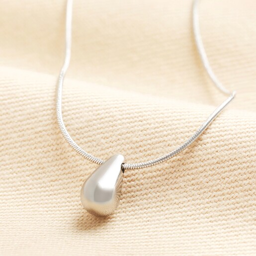 Stainless Steel Teardrop Necklace in Silver  Stainless Steel Teardrop Necklace in Silver on a neutral background
