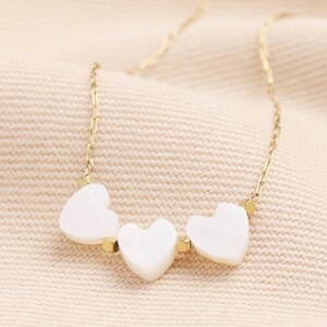 Triple Heart Pendant Necklace in Gold