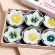 Hana Blossom Assorted White Garden Flower Scented Tealights close up in box