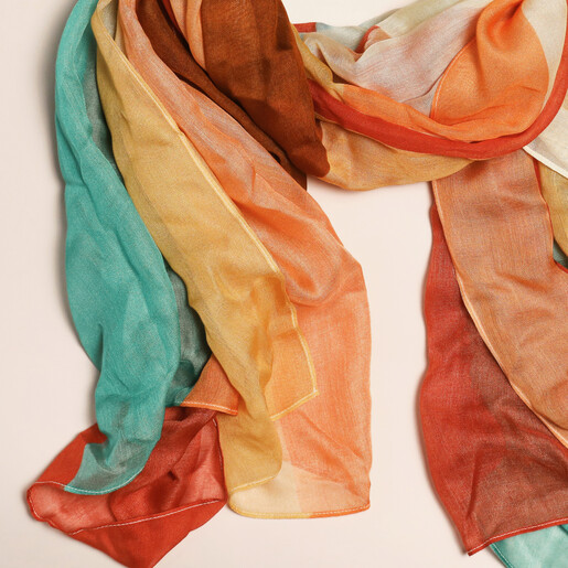 Abstract Red and Blue Colour Block Scarf on a neutral background close up