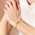 Model Shot of Asymmetrical Layered Bar Bracelet in Gold