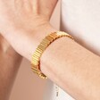 Close Up of  Asymmetrical Layered Bar Bracelet in Gold on Model