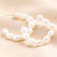 Oversized Freshwater Pearl Hoop Earrings on beige material background