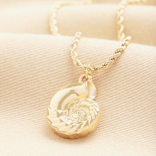 Swirl Shell Pendant Necklace in Gold A gold shell pendant necklace that's ideal for any occasion