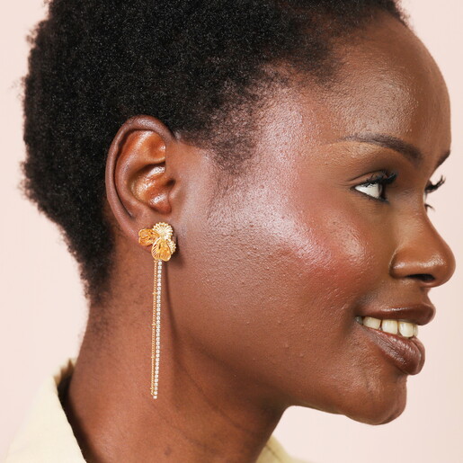 side profile of drop earrings in gold