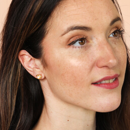 Tiny Gold Shell Studs with Pearl Details on Model