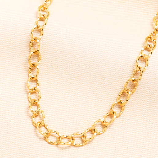 A String of Gold Oval Links with a Textured Surface Effect Ideal for Layering with Other Chains and Necklaces