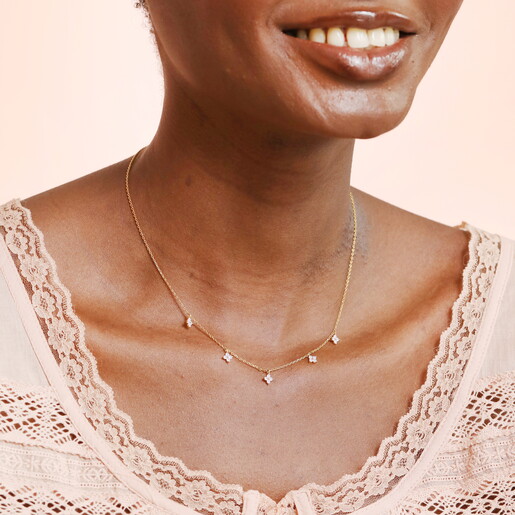 A Delicate Gold Trace Chain With Tiny Crystal Flower Charms in Pale Purple