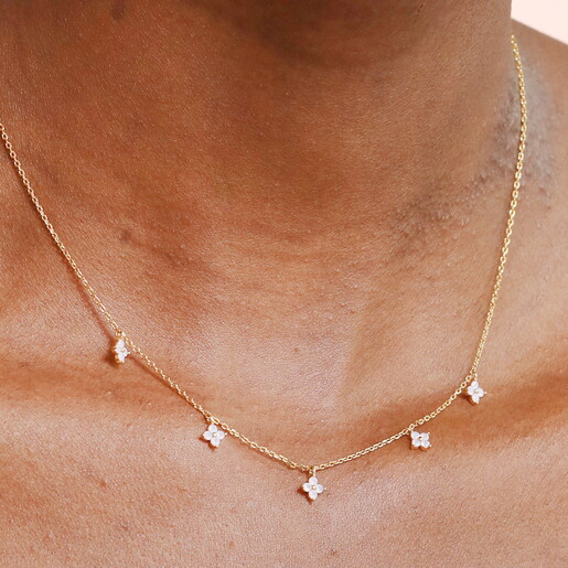 A Delicate Gold Trace Chain With Tiny Crystal Flower Charms in Pale Purple