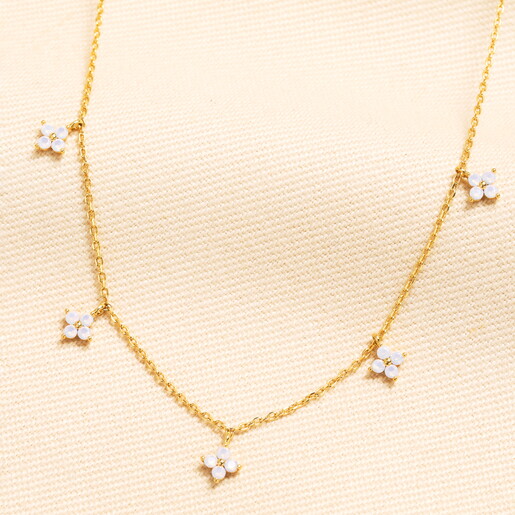 A Delicate Gold Trace Chain With Tiny Crystal Flower Charms in Pale Purple
