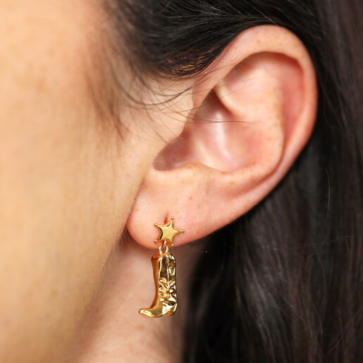 Model Wearing Star Studs with Dangly Cowgirl Boot Charm Earrings in Lobe