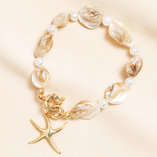 oceanic bracelet with starfish charm in gold
