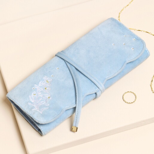 blue jewellery roll with a floral design
