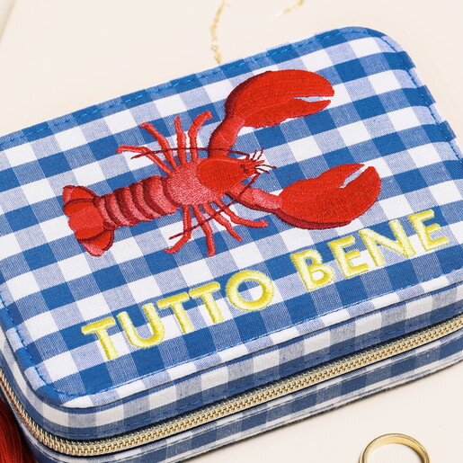 close up of lobster and blue gingham design