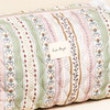 close up of Lisa Angel logo against quilted fabric