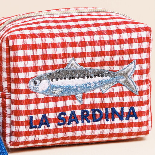 close up of la sardina text in blue