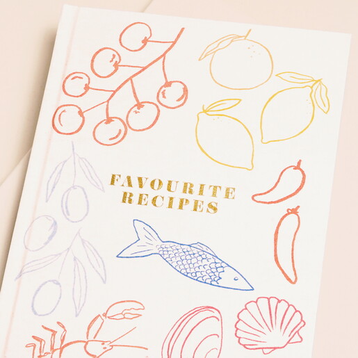 Close Up of Cover on Cream Linen Favourite Recipes Cookbook Journal