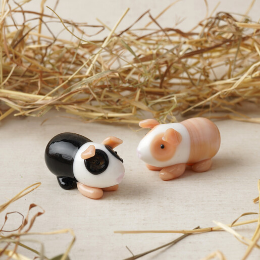 glass guinea pigs in beige or black